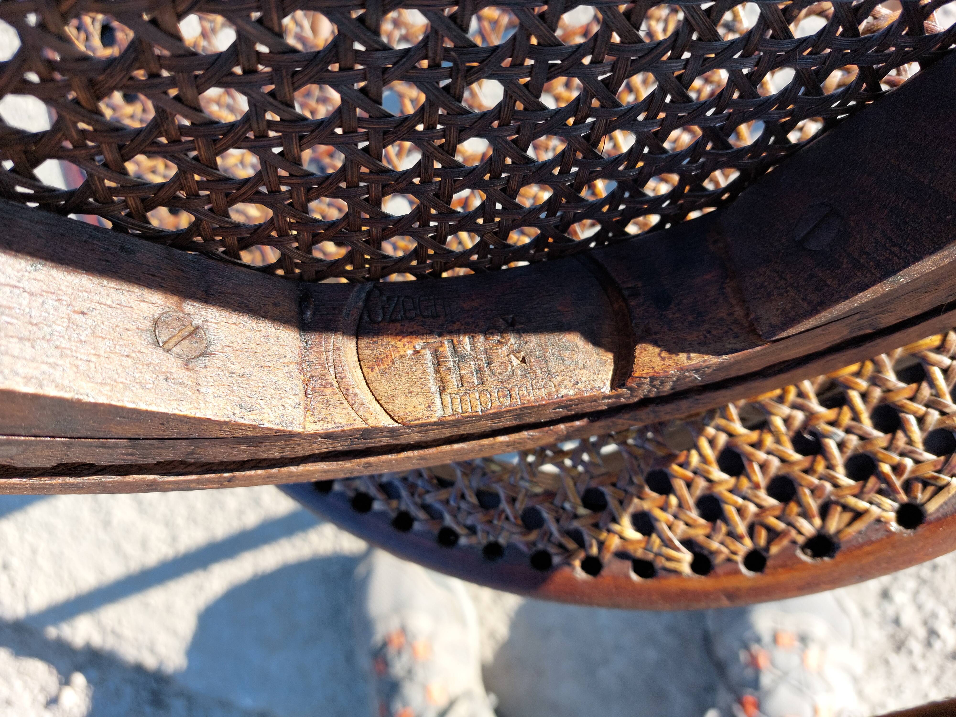 Pair of low caned stools signed Thonet - 1920s