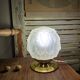 Vintage Art Deco table lamp with its artichoke globe.