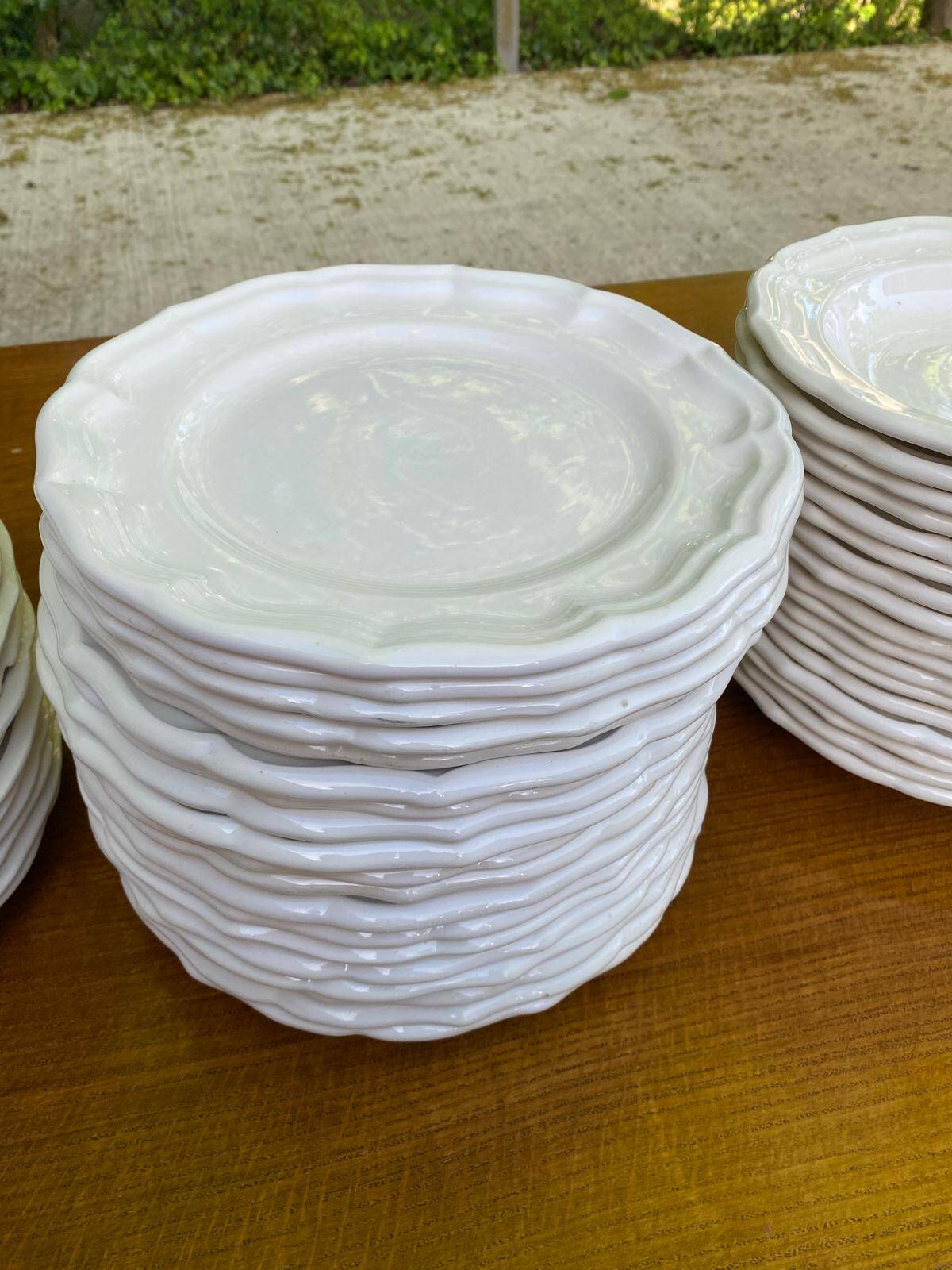 Service of 84 vintage white porcelain plates.