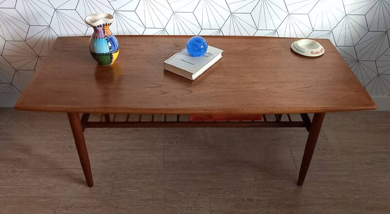 Danish 1960s teak coffee table with slatted shelf.
