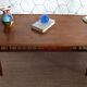 Danish 1960s teak coffee table with slatted shelf.