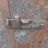 Grey industrial metal cabinet to be restored