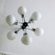 Mid century chandelier with 9 radiating milk glass globes 1970s
