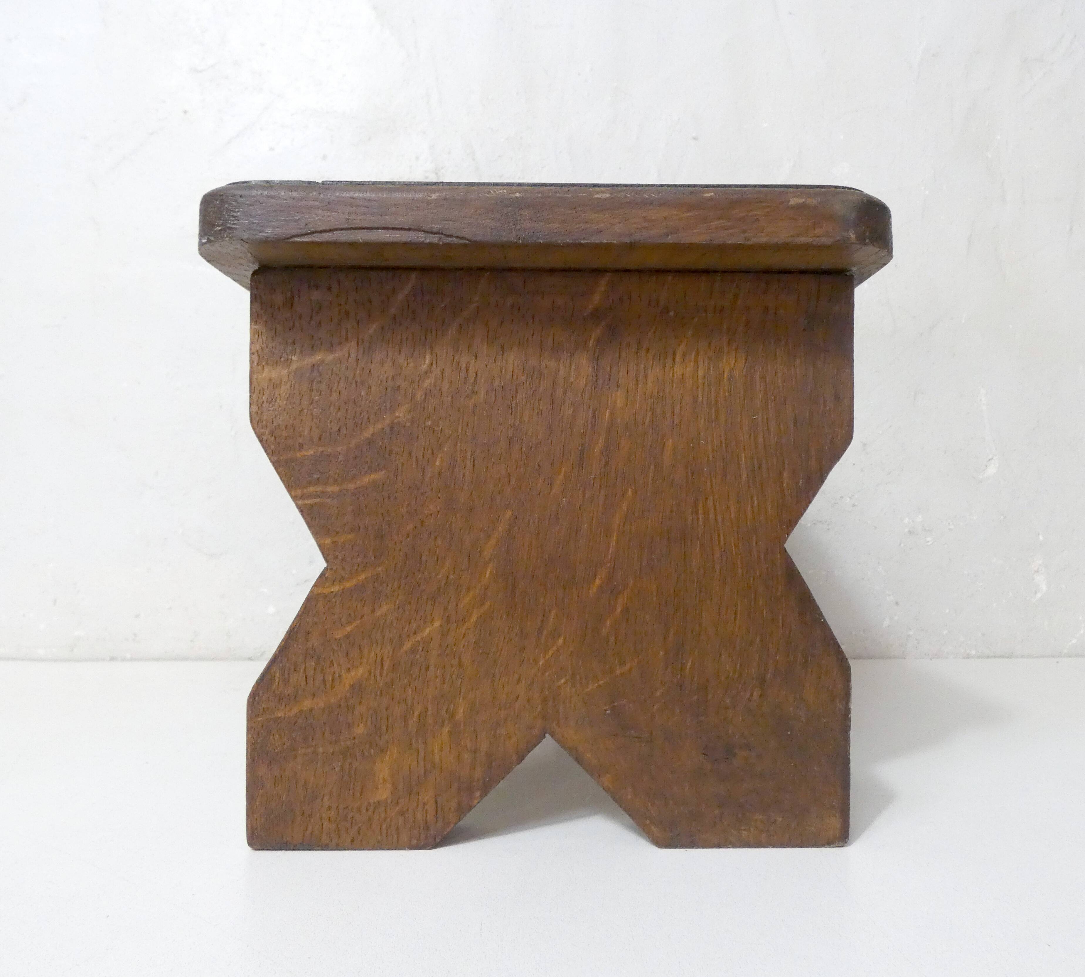 Old small bench in solid oak wood vintage step stool