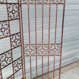 Screen partition wall made of glass and wrought iron