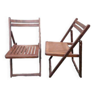 2 wooden folding chairs