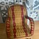 Antique miniature rocking chair in rattan for dolls.