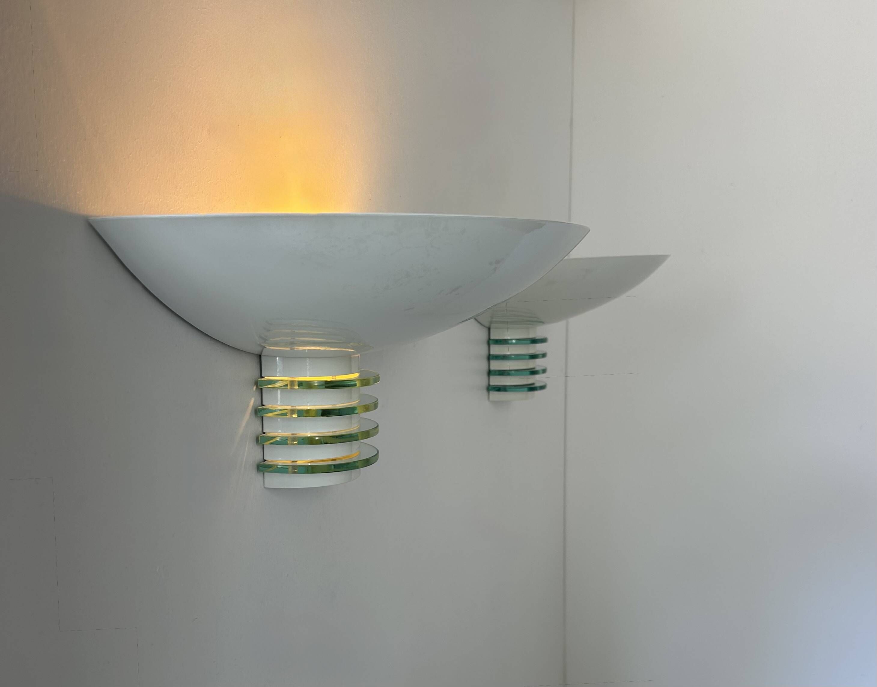 Pair of post-modernist wall lights, white metal and glass, France 1980