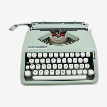 Machine à écrire Hermes Baby cursive révisée ruban neuf