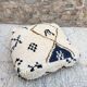 Berber floor pouf: Handwoven Moroccan wool cushion.