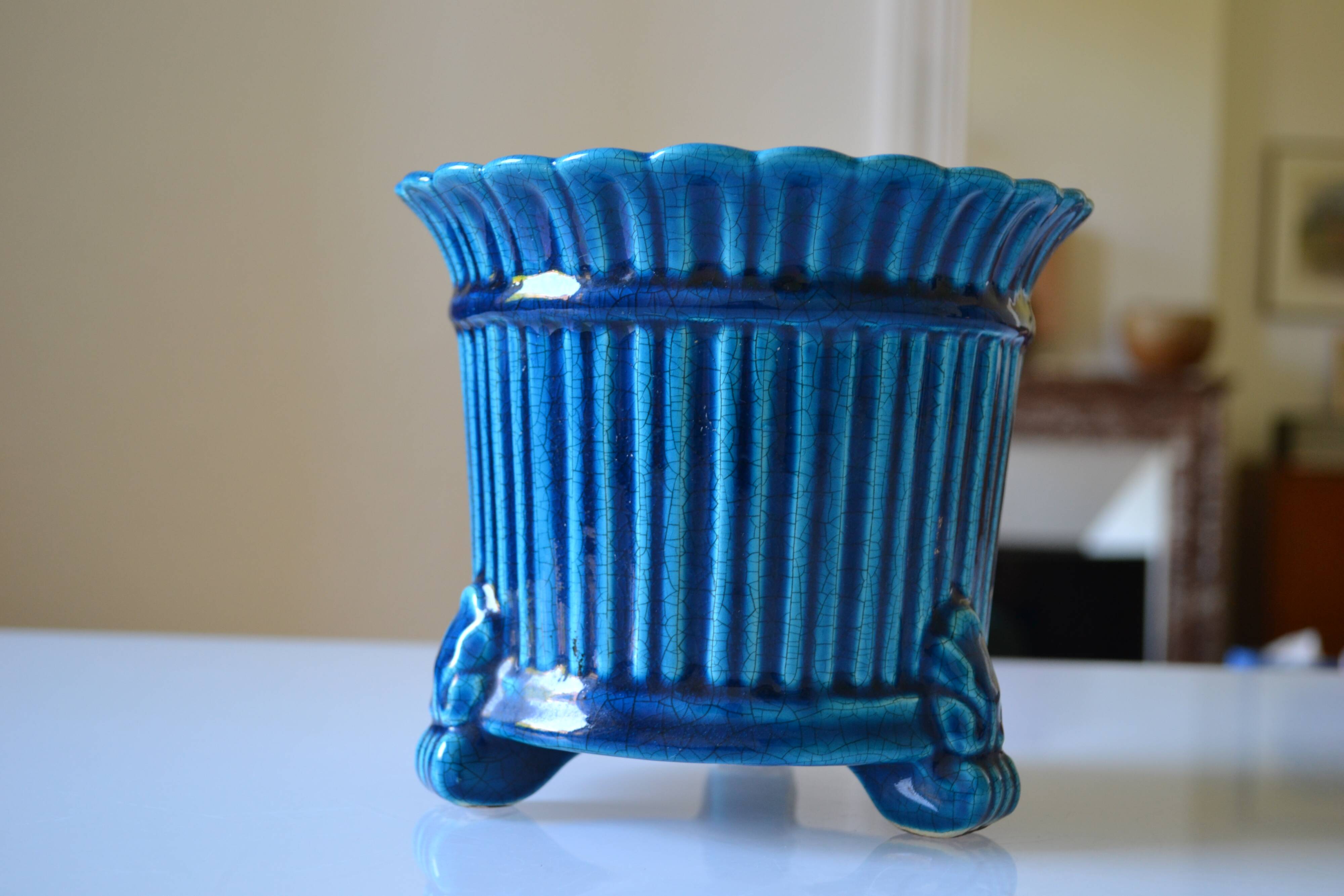 Cracked blue ceramic cache pot