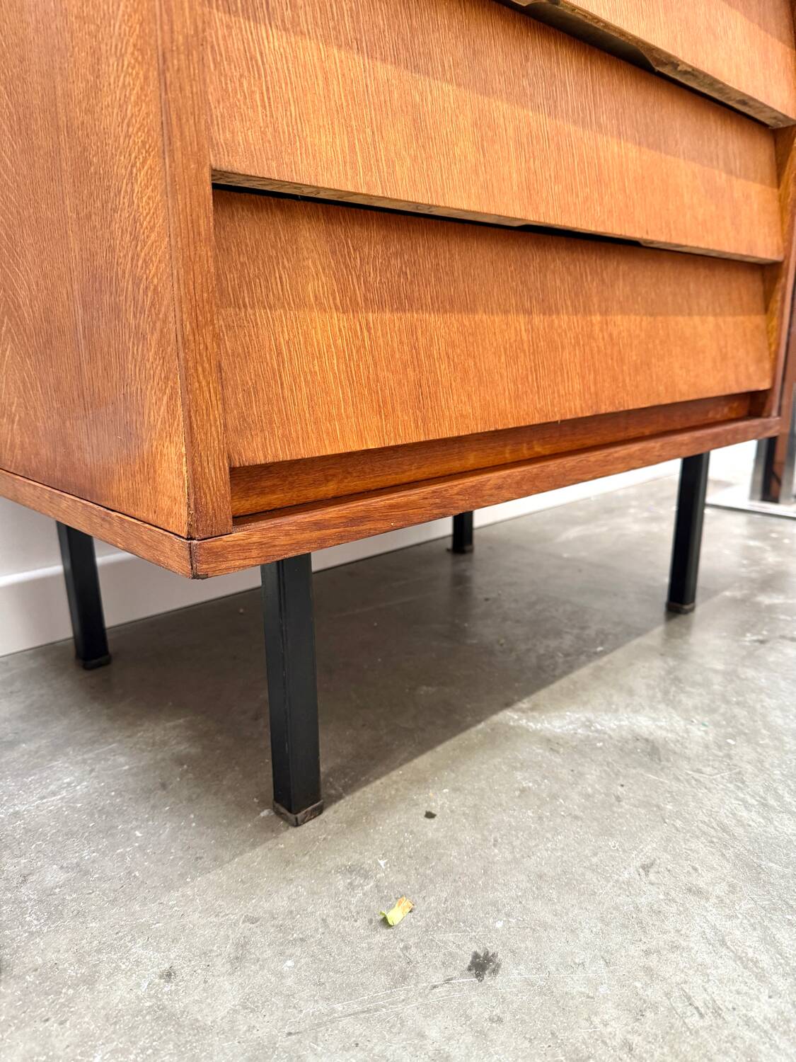 Modernist chest of drawers with slanted drawers