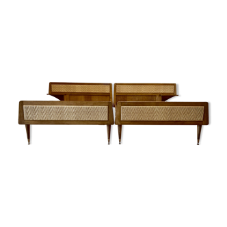 Pair of 1950s designer rattan beds.