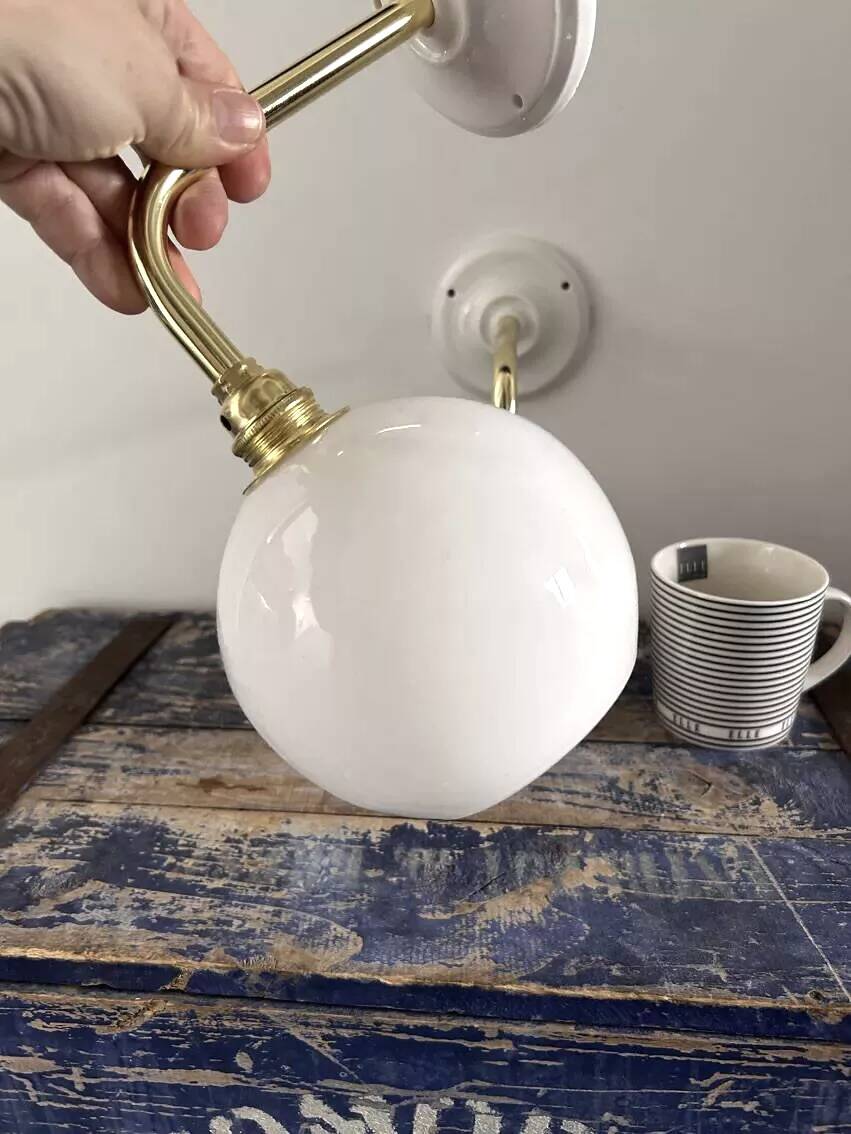 Pair of white opaline sconces