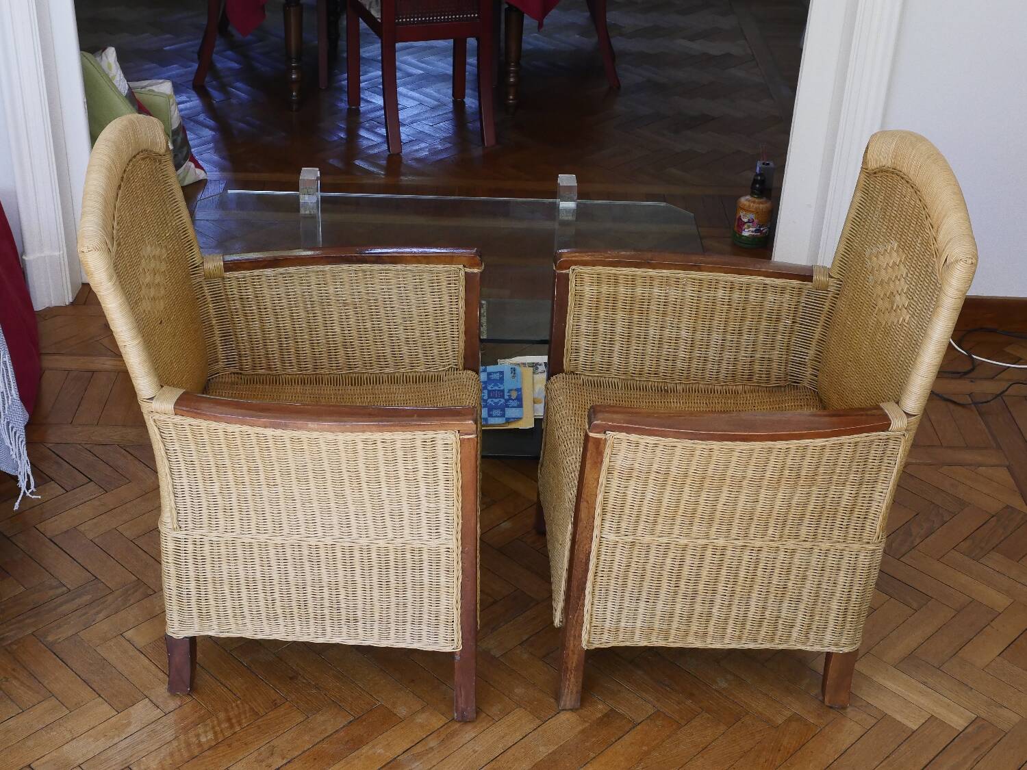 2 rattan and wood armchairs
