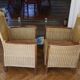 2 rattan and wood armchairs