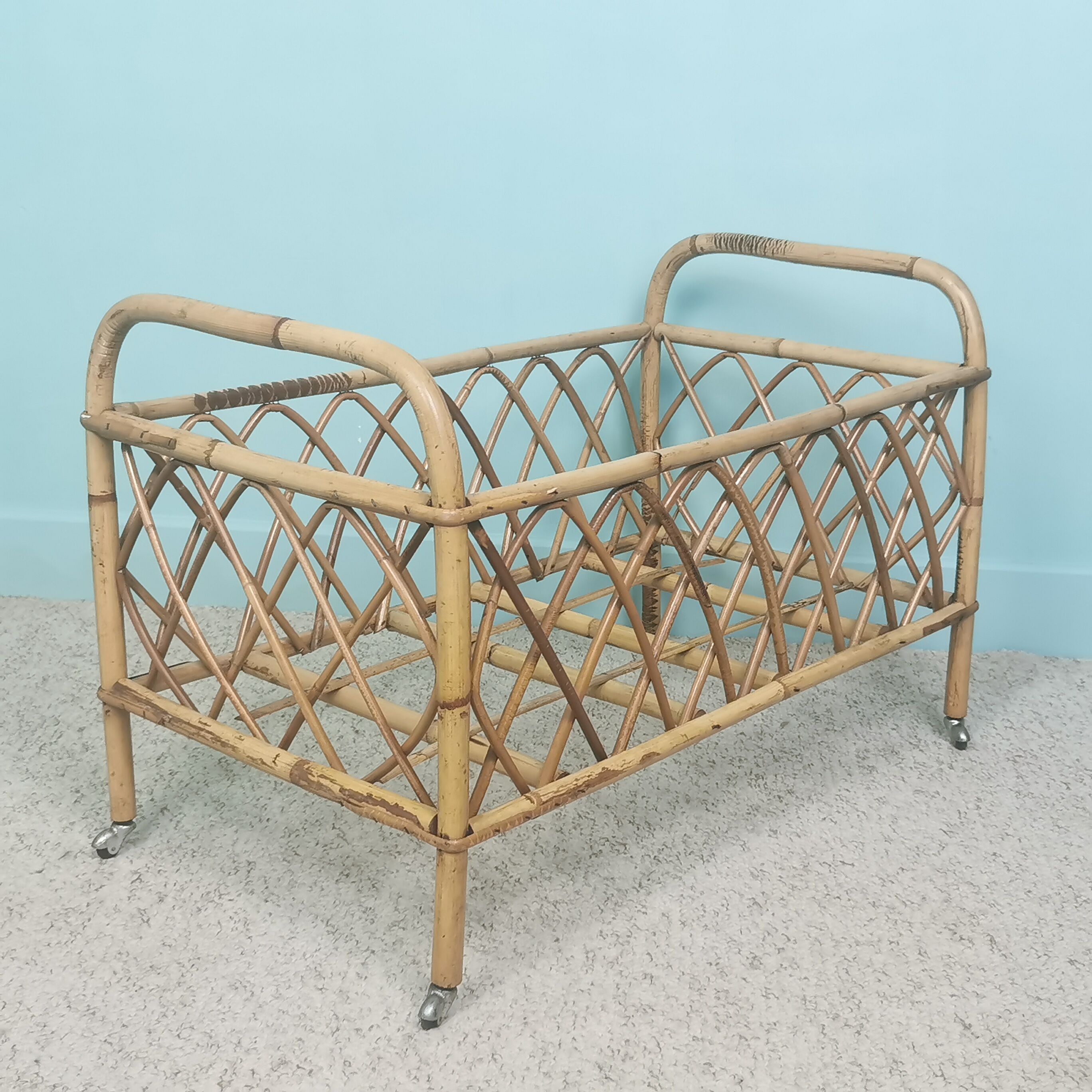 Rattan doll bed
