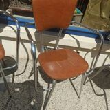 Set of 4 armchairs in chromed metal and brown imitation leather, circa 1960