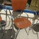 Set of 4 armchairs in chromed metal and brown imitation leather, circa 1960
