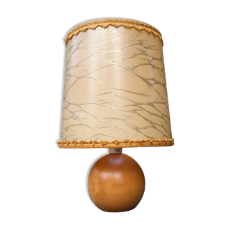 Light wood round foot laying lamp and old lampshade
