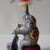 Vintage mechanical toys 'JW /Germany Western' 'Elephant on scooter'