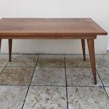 Vintage oak table with tapered legs.