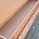 Commode vintage pied compas et rotin