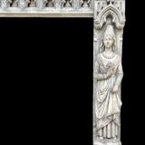 Neo-Gothic stone fireplace