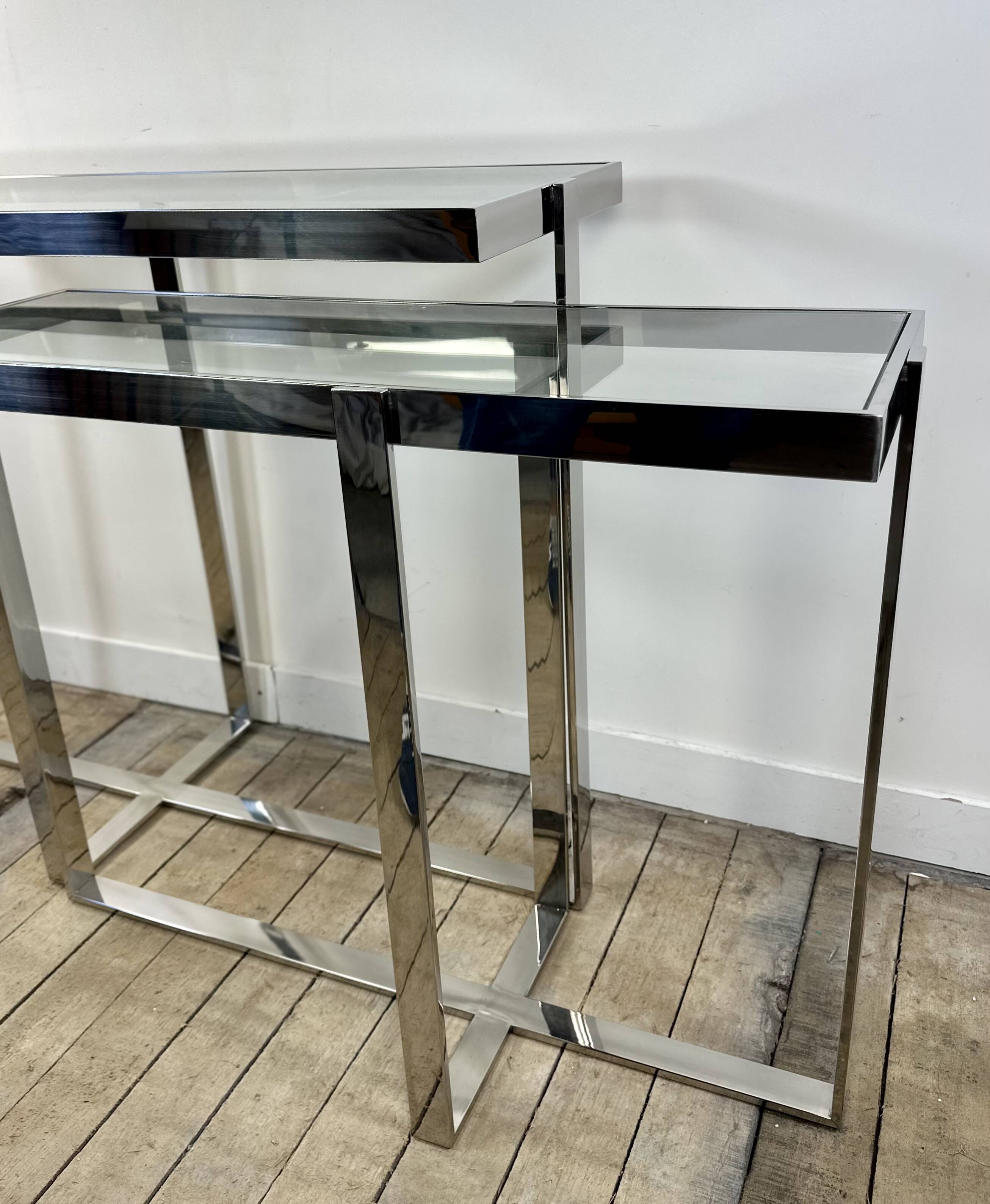 Chrome metal and glass console from the 2000s.