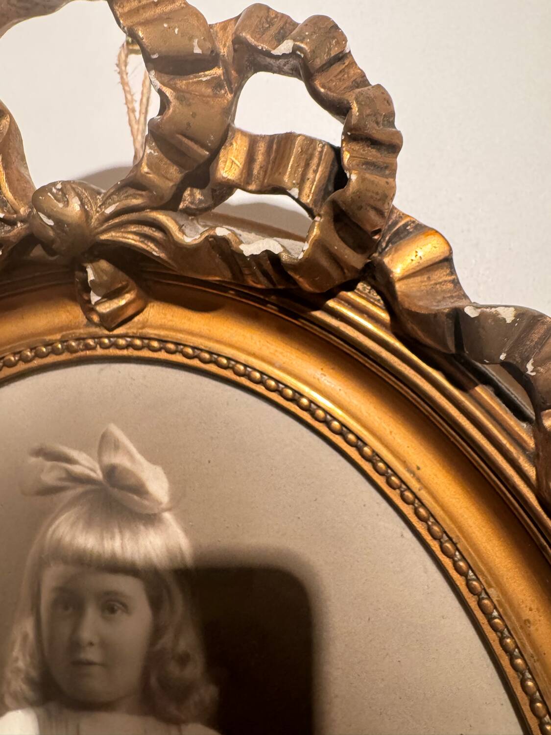 Old photograph, young girl with ribbon, 19th century