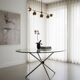 Vintage round table with smoked glass and foldable chrome legs.