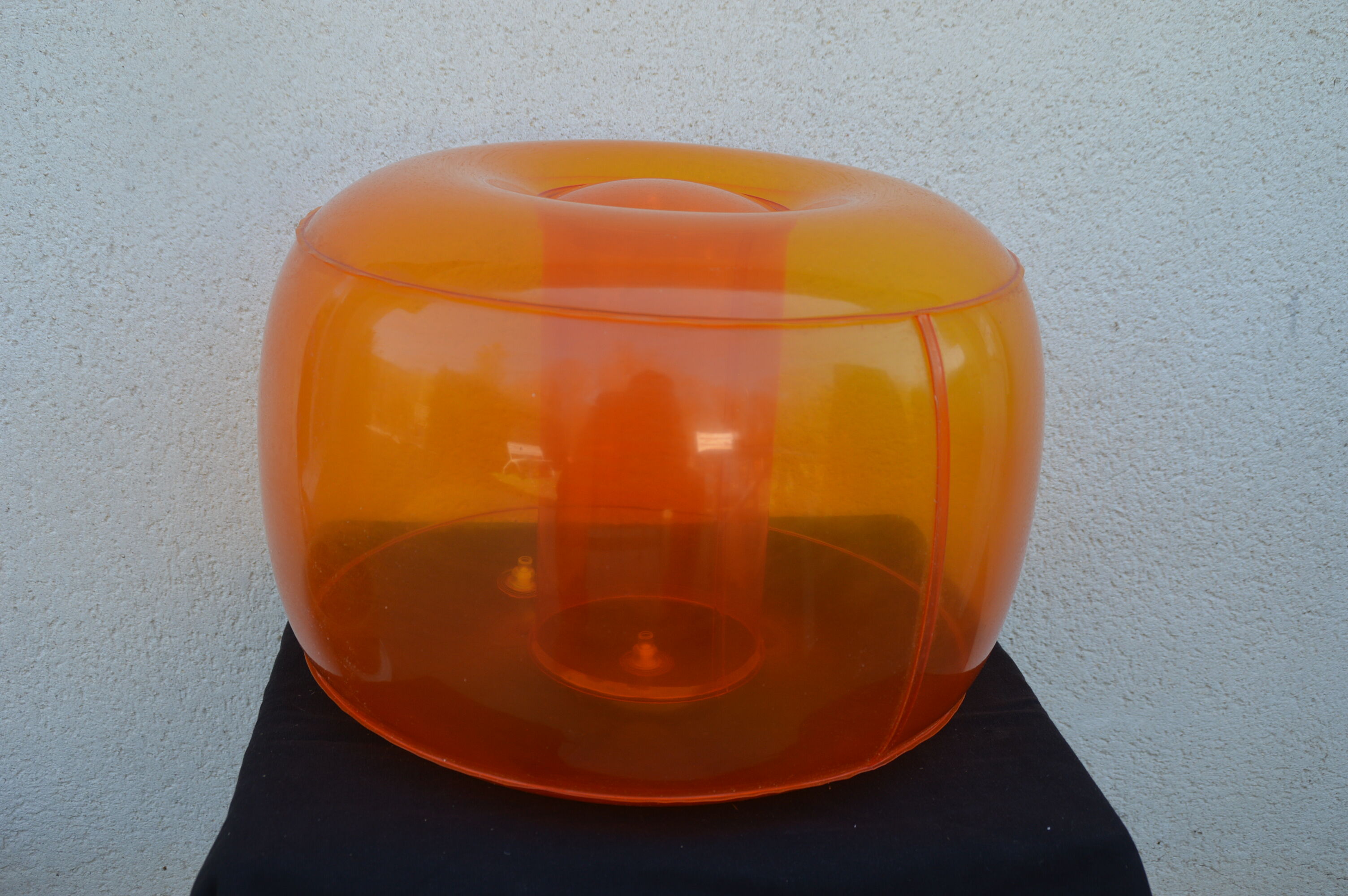 Inflatable plastic pouf