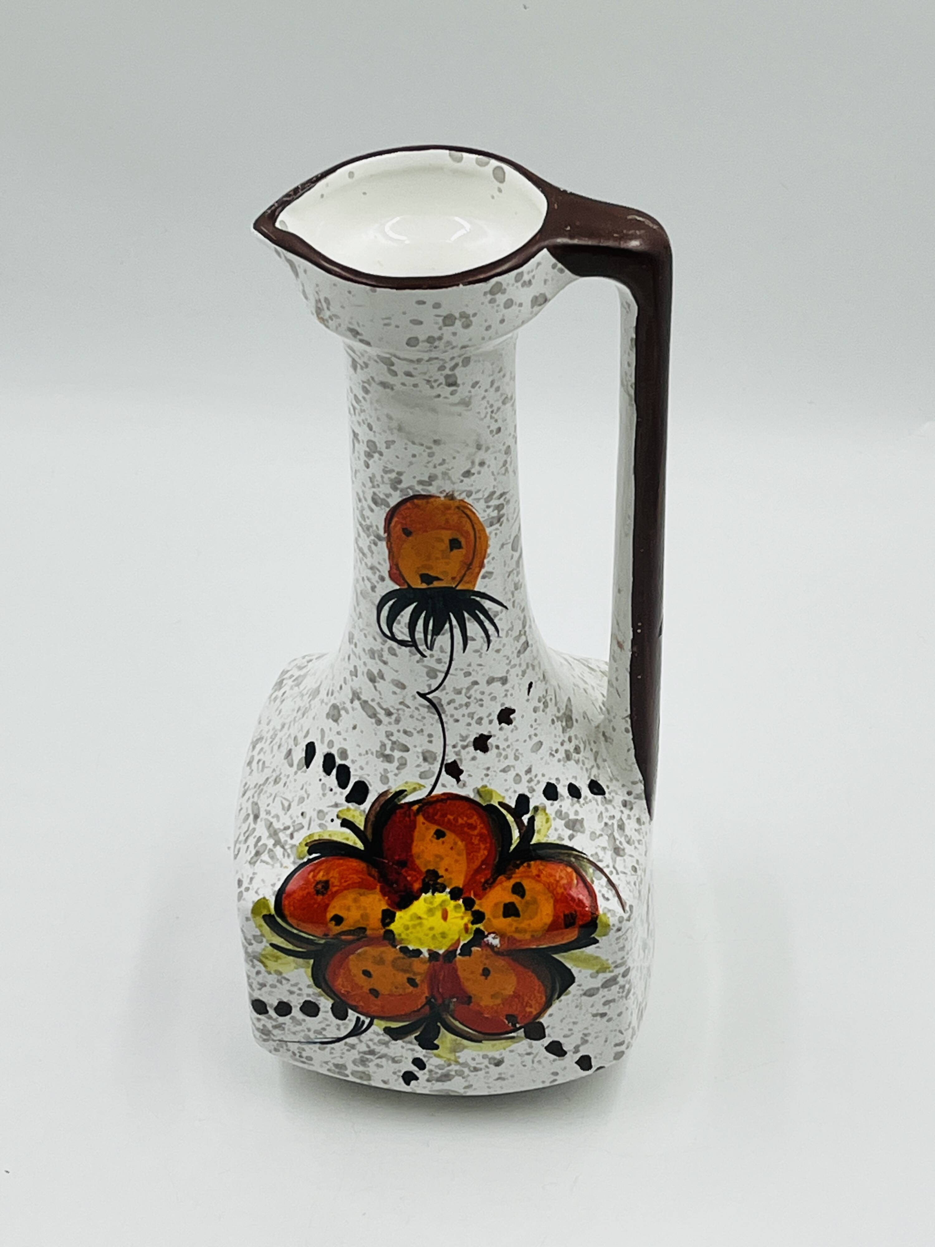 Vintage Italian vase in the shape of a carafe with floral decoration from the 1970s.
