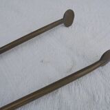 Old brass log clamp for fireplace