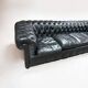 Large and old four-seater leather chesterfield sofa early 20th century l 260 cm