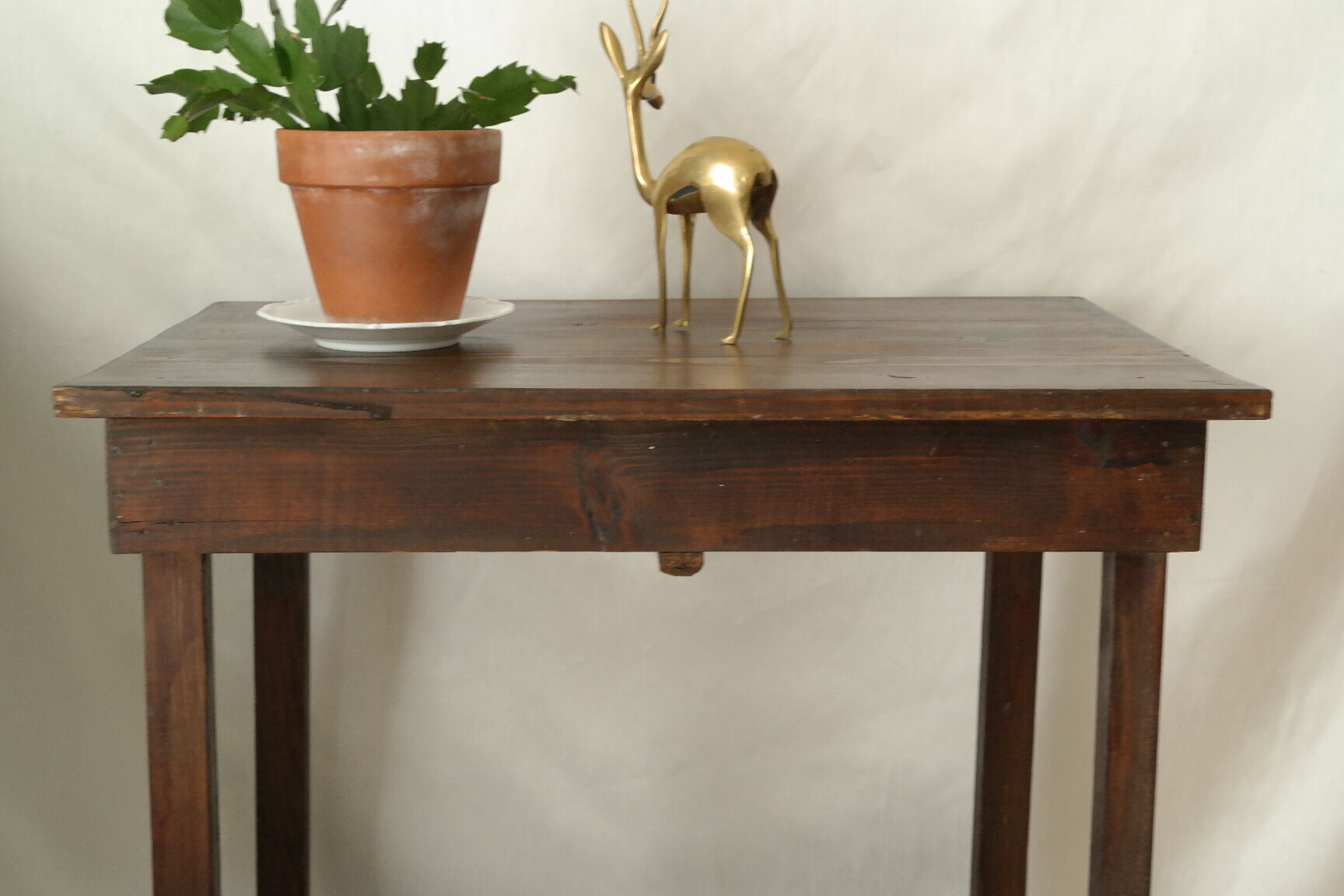 Old country side table in waxed wood