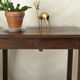 Old country side table in waxed wood