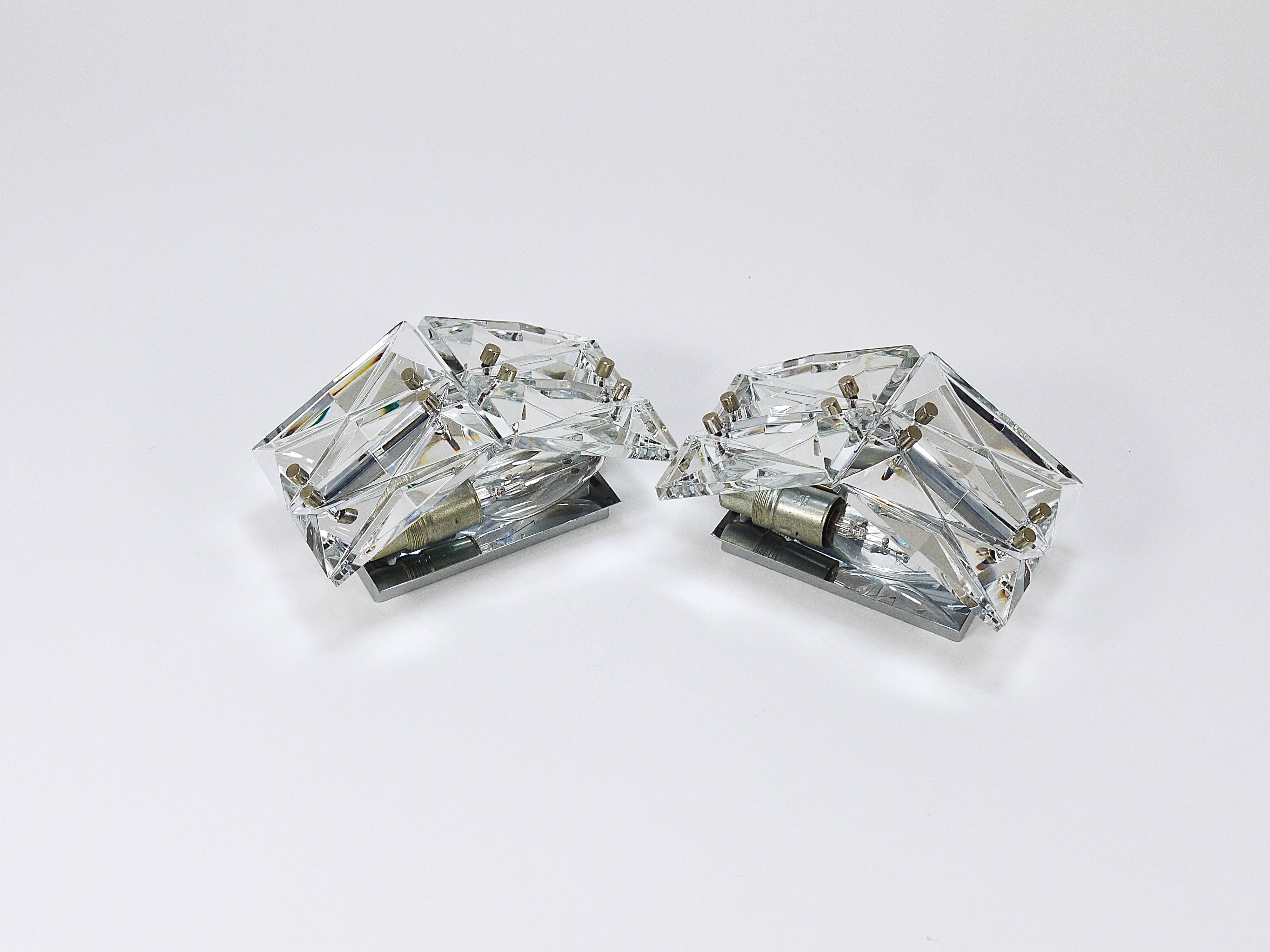 Pair of wall sconces in faceted crystal and chrome / prism glass wall lamps by Kinkeldey