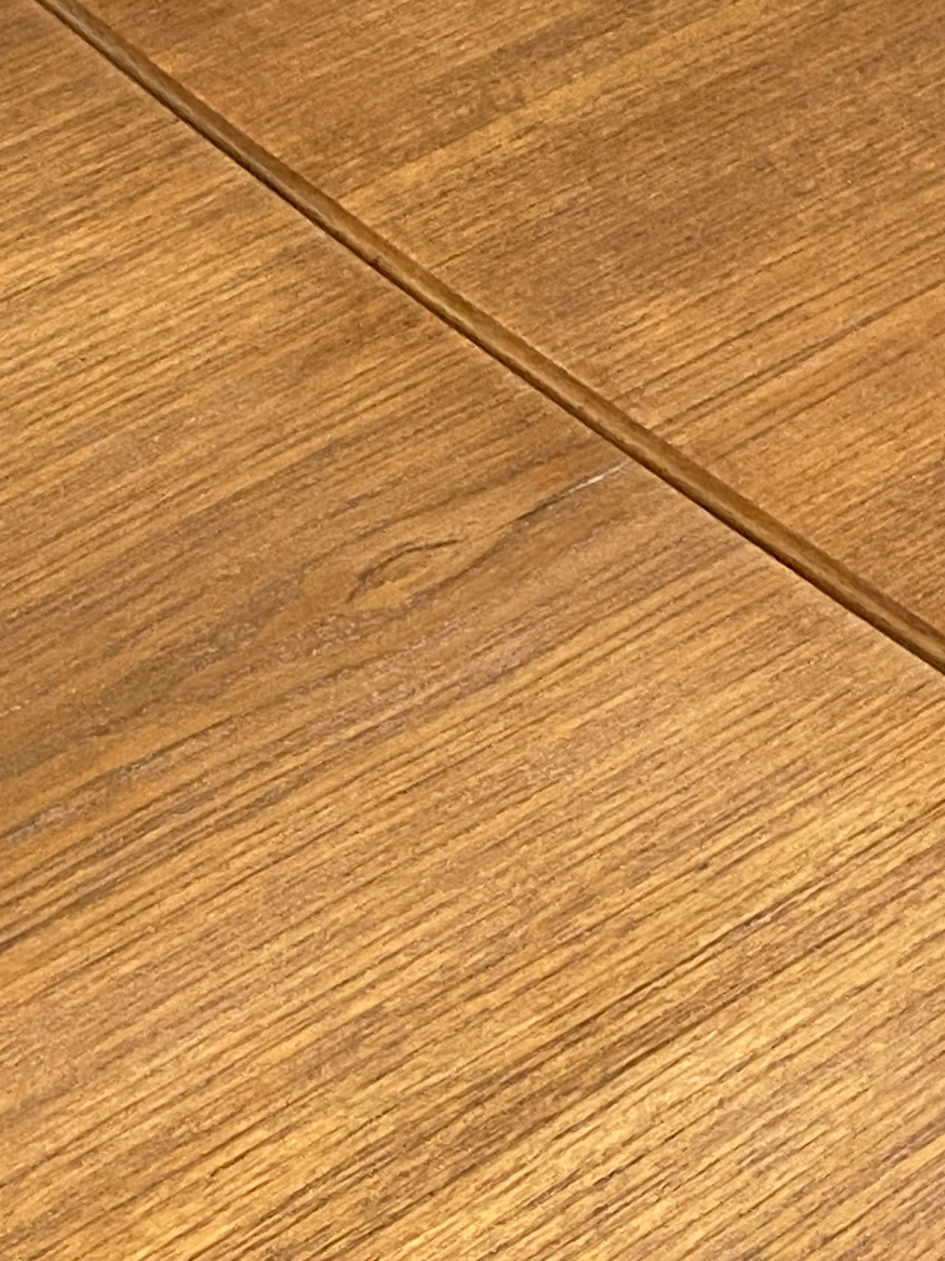 Extendable Scandinavian teak table by Johannes Andersen for Samcom Denmark.