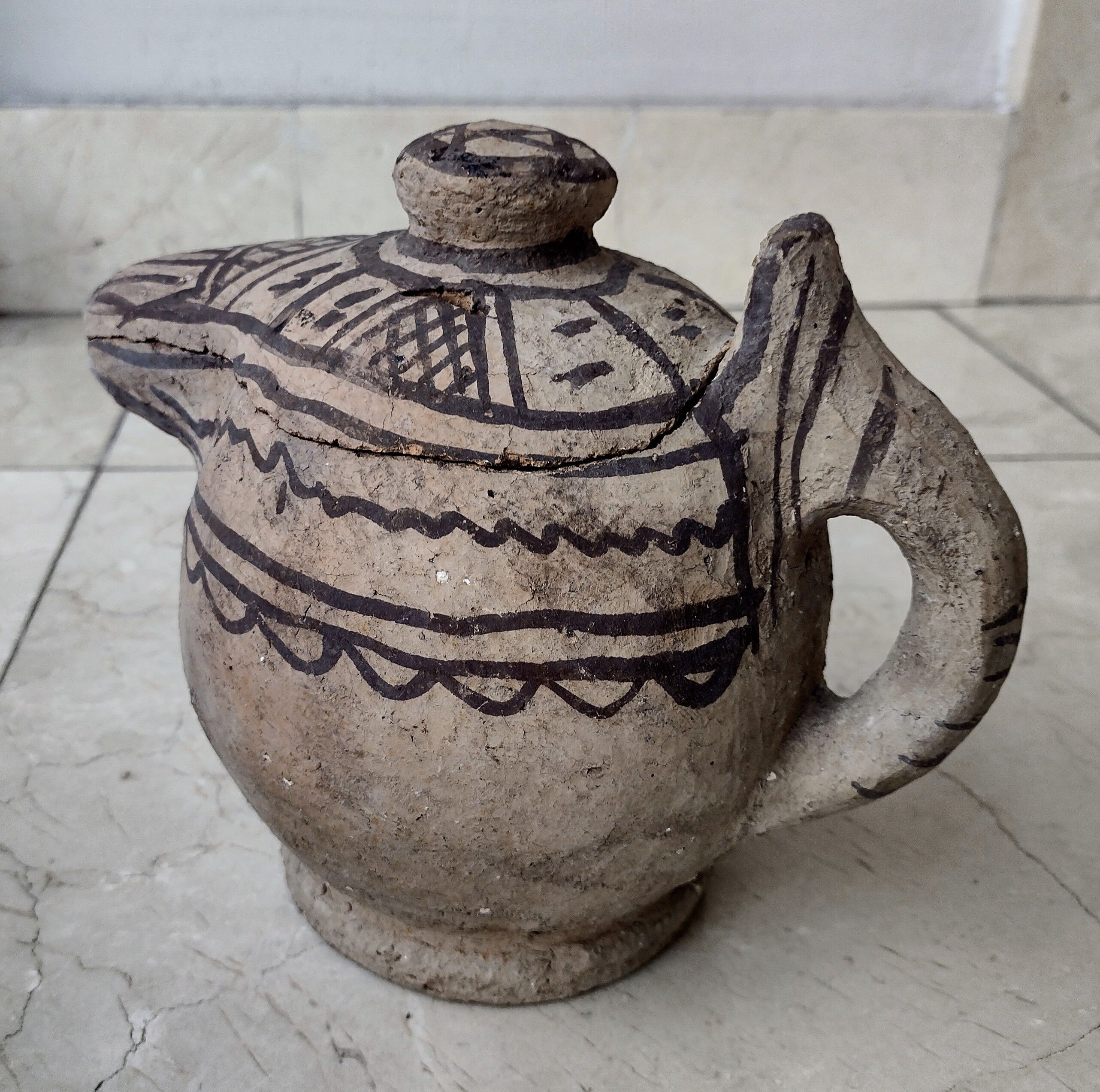 Berber earthenwear milk jug