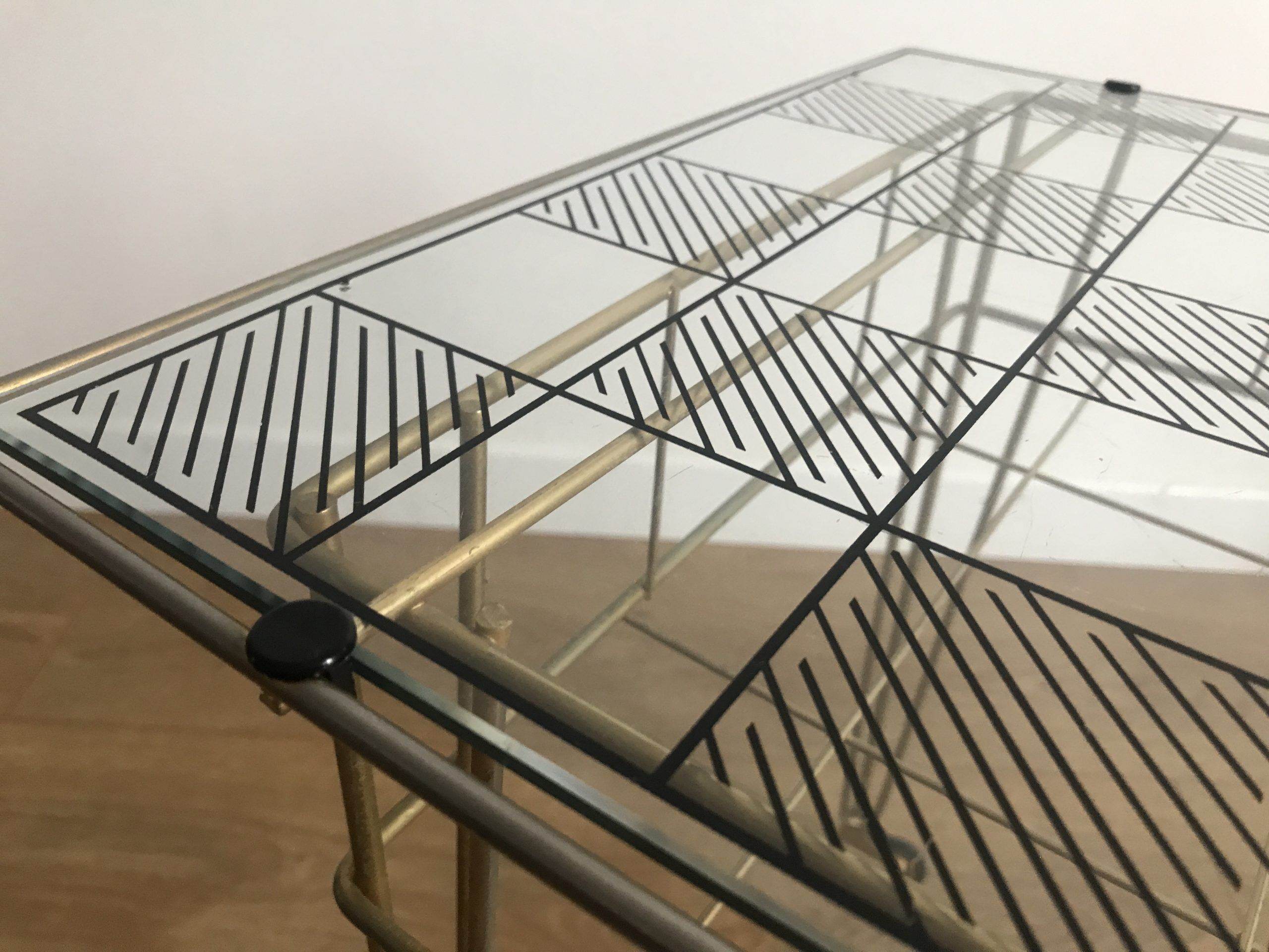 Side table gold vinyl door with wheels eiffel legs and glass checkered top