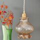 Vintage amber glass suspension globe
