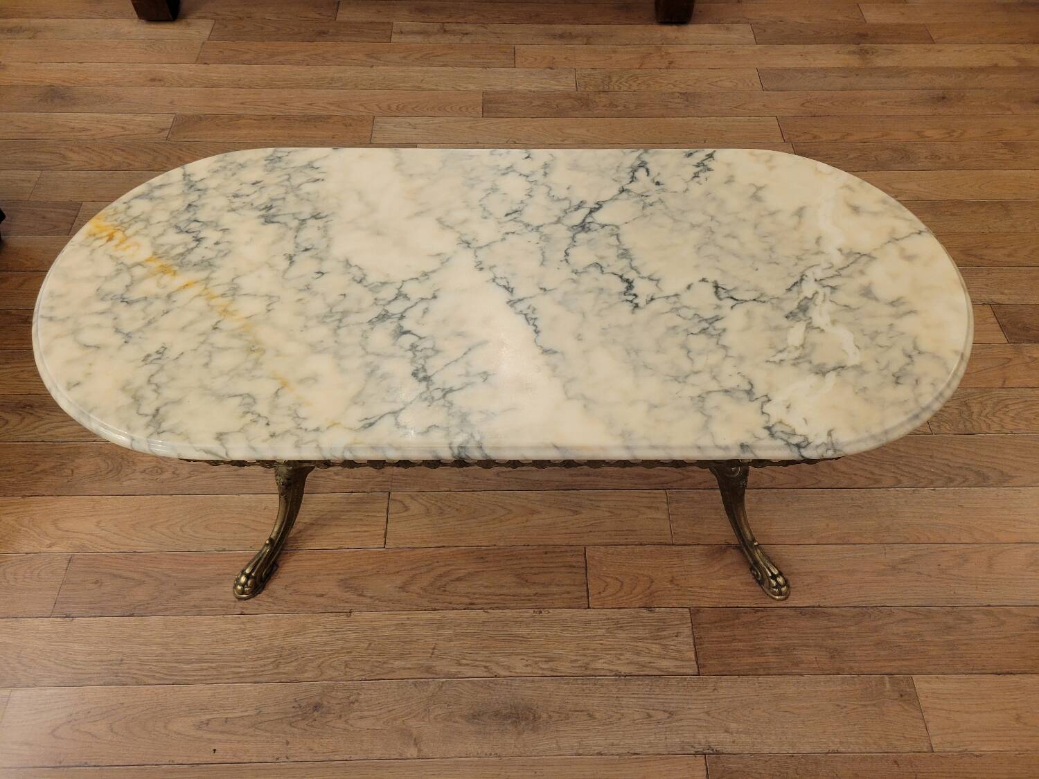 Coffee table in gilded bronze and marble