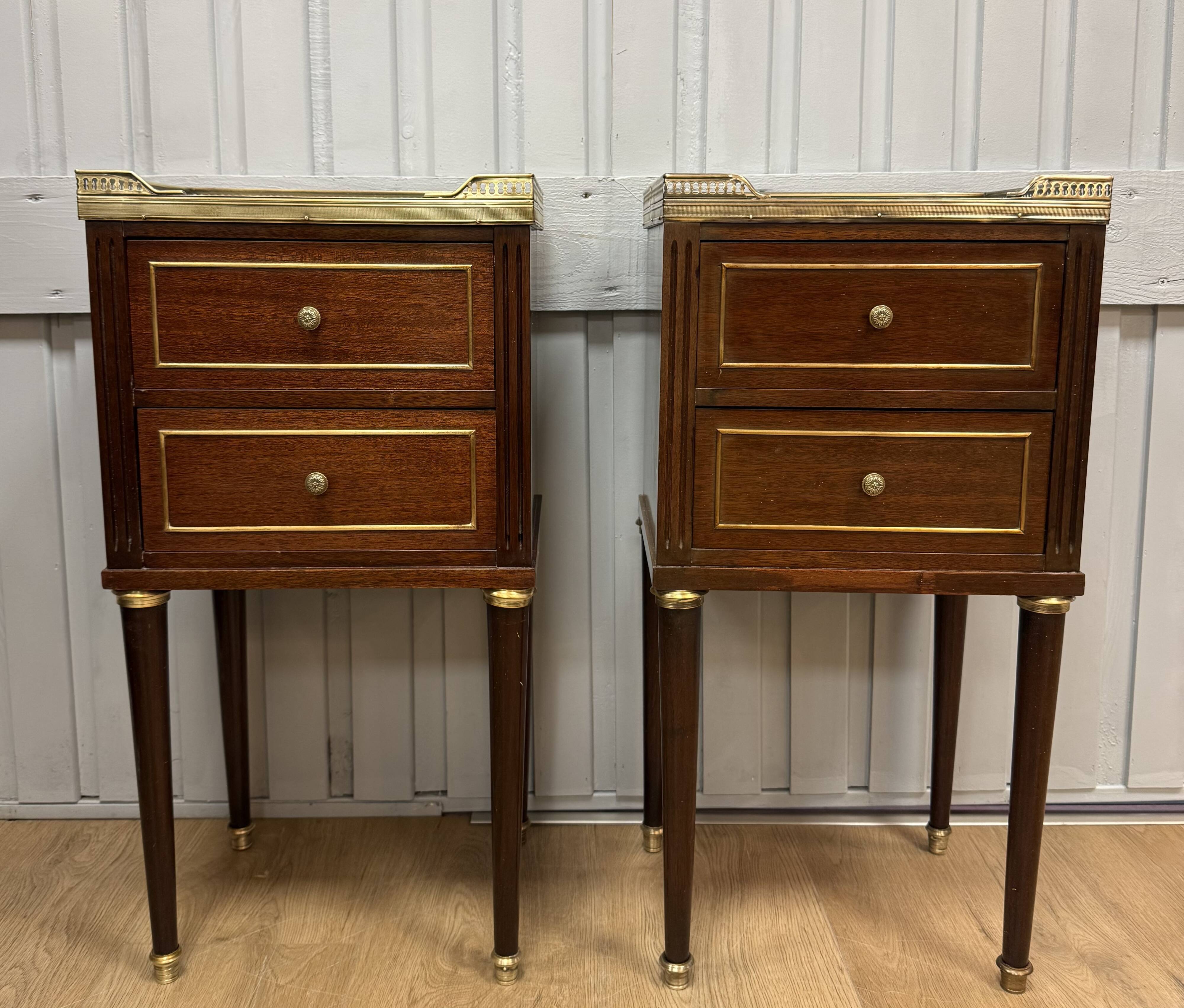 Pair of Louis XVI style bedside tables in mahogany