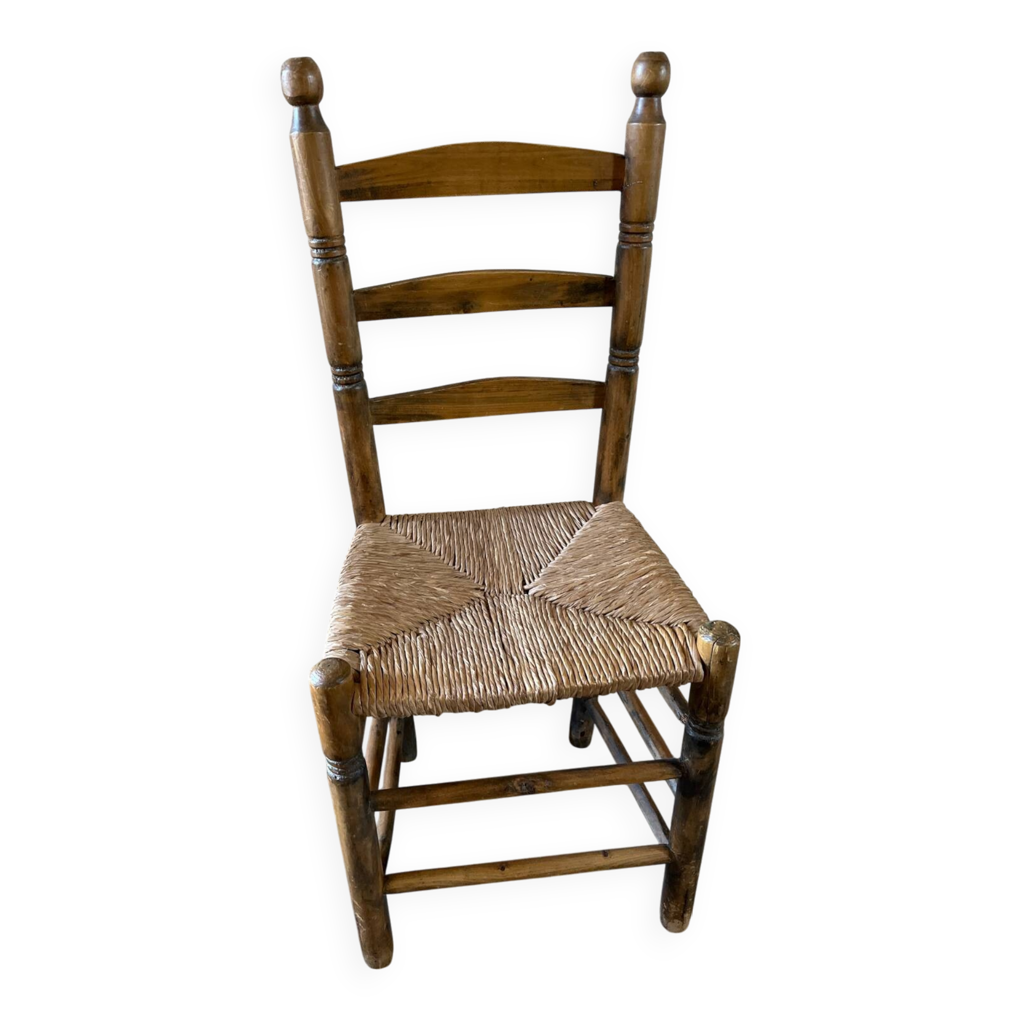 Old turned and stuffed wooden chair