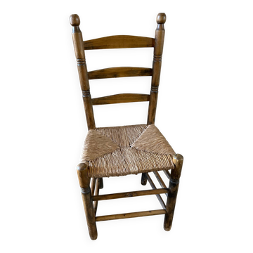 Old turned and stuffed wooden chair