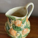 Orange slipware pitcher