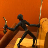 Art Deco bronze and sycamore bookends pair