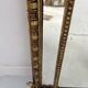 Louis XVI style mirror with parecloses in wood and gilded stucco, 19th century
