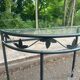 Grey-green wrought iron half-moon console with glass, 85cm.